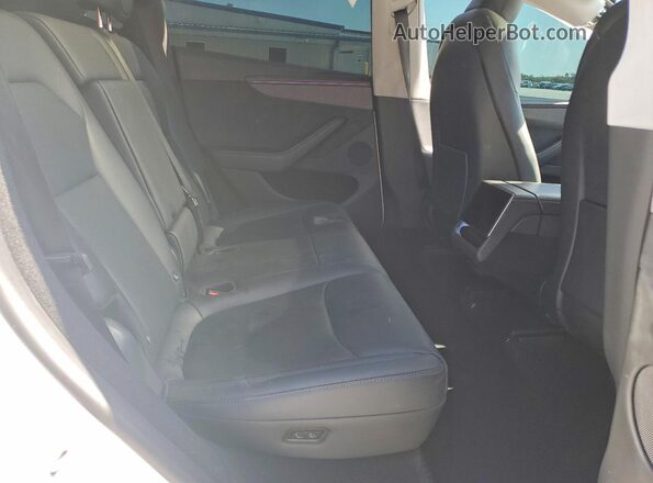 7SAYGDEE6TA461090 2026 TESLA MODEL White Rear seats view