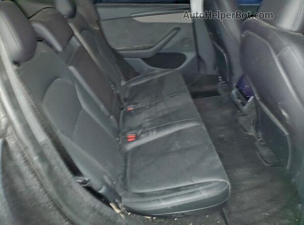 7SAYGDEE6TA463454 2026 TESLA MODEL Black Հետևի նստատեղերի տեսք