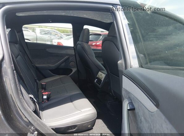 7SAYGDEE6TF588098 2026 TESLA MODEL Y Black VIN კოდის სტიკერის ხედი