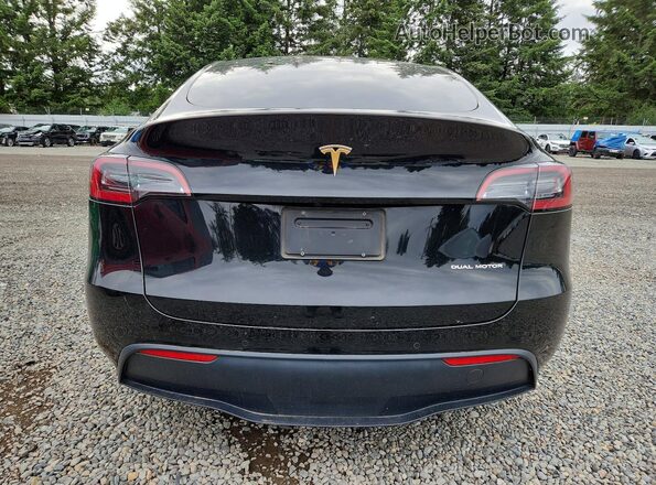 7SAYGDEE7NF393839 2022 TESLA MODEL Black Rear view