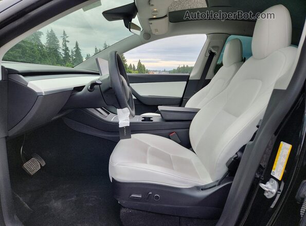 7SAYGDEE7NF393839 2022 TESLA MODEL Black Front interior view