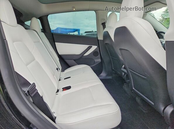 7SAYGDEE7NF393839 2022 TESLA MODEL Black Rear interior view
