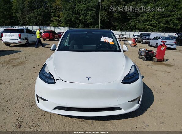 7SAYGDEE7PA024656 2023 TESLA MODEL Y White Vista interior trasera