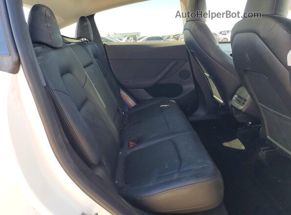 7SAYGDEE7PA034748 2023 TESLA MODEL White Rear seats view