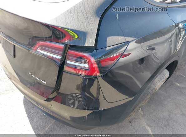 7SAYGDEE7PA125907 2023 TESLA MODEL Y Black Հետևի աջ