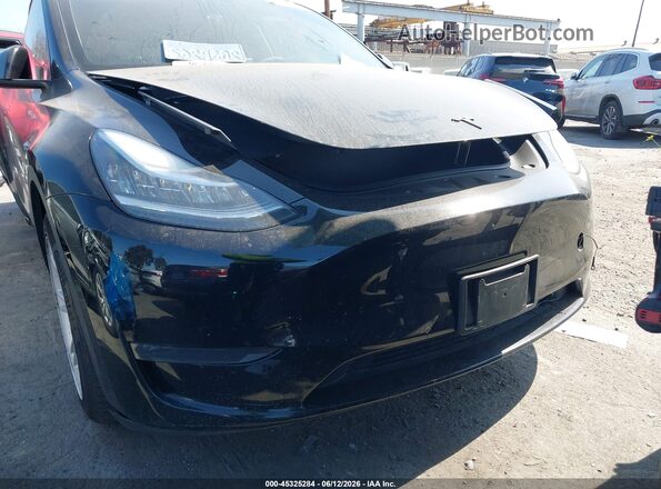 7SAYGDEE7PA125907 2023 TESLA MODEL Y Black Սարքավորումների վահանակի տեսք