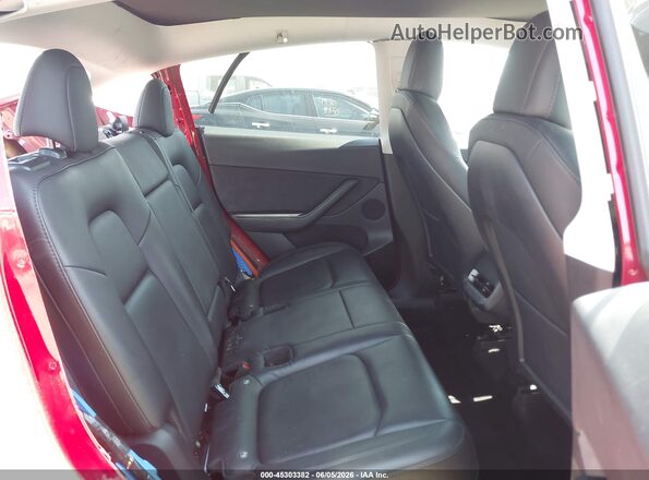 7SAYGDEE7PF667849 2023 TESLA MODEL Y Red VIN կոդի պիտակի տեսք