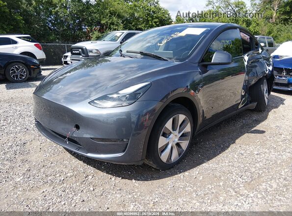 7SAYGDEE7PF852693 2023 TESLA MODEL Y Gray წინა მარცხენა ხედი სამი მეოთხედიდან