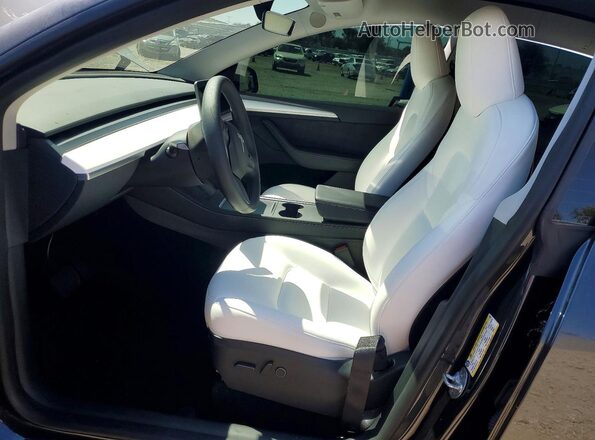 7SAYGDEE7RA220227 2024 TESLA MODEL Gray Front interior view