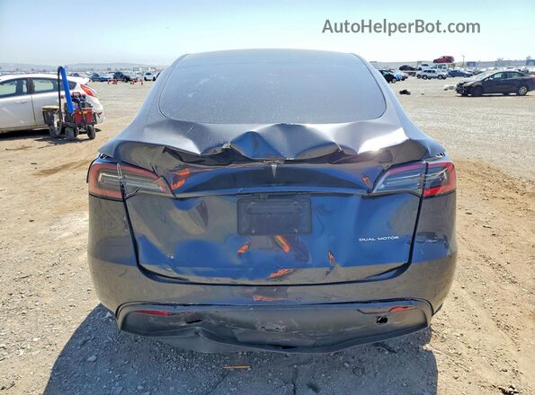 7SAYGDEE7RA220227 2024 TESLA MODEL Gray Rear view