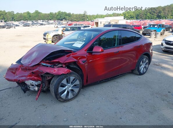 7SAYGDEE7RF047067 2024 TESLA MODEL Y Red Առջևի ձախ երեք քառորդ տեսարան