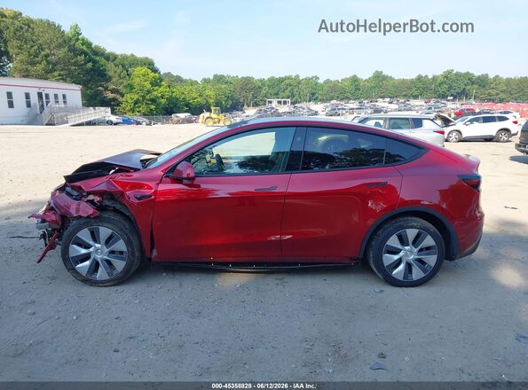 7SAYGDEE7RF047067 2024 TESLA MODEL Y Red Սալոնի հետևի տեսք