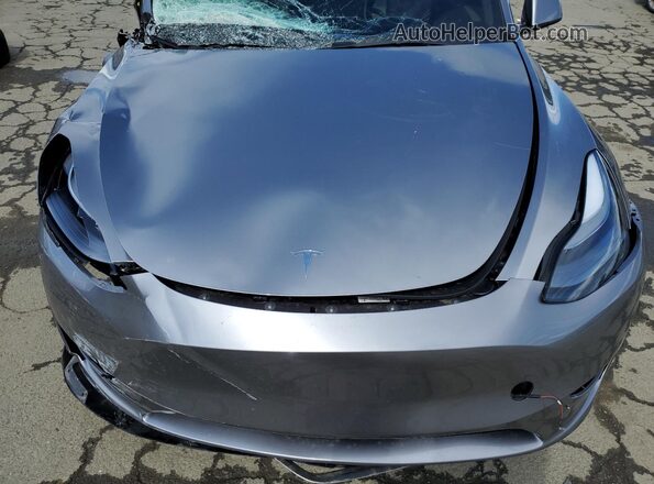 7SAYGDEE7SF240633 2025 TESLA MODEL Gray Rear interior view