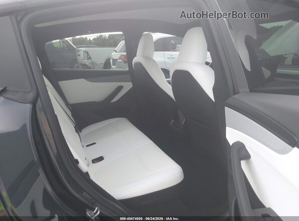 7SAYGDEE7TA635085 2026 TESLA MODEL Y Gray Vista de la etiqueta del VIN