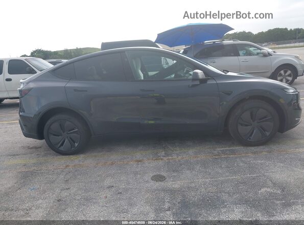 7SAYGDEE7TA635085 2026 TESLA MODEL Y Gray Vista interior trasera
