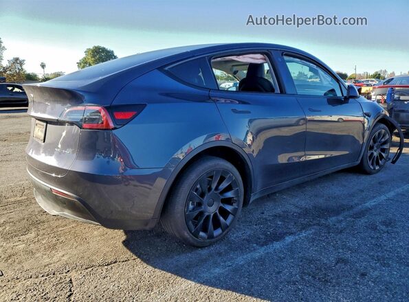 7SAYGDEE8PA050599 2023 TESLA MODEL Gray 