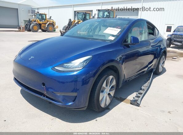 7SAYGDEE8PA077463 2023 TESLA MODEL Y Blue Przód lewy