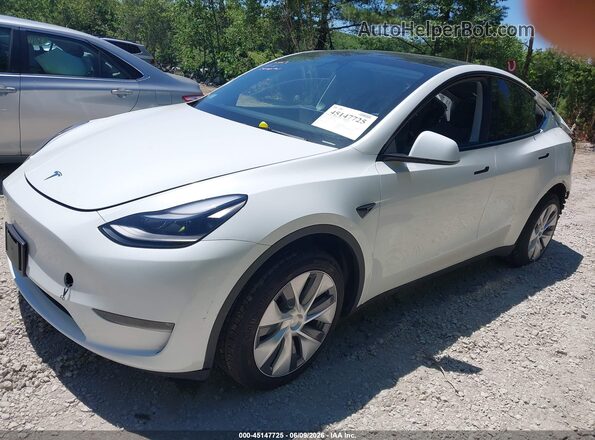 7SAYGDEE8PA120053 2023 TESLA MODEL Y White Przód lewy