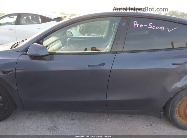7SAYGDEE8PF639929 2023 TESLA MODEL Y Gray Vista interior trasera