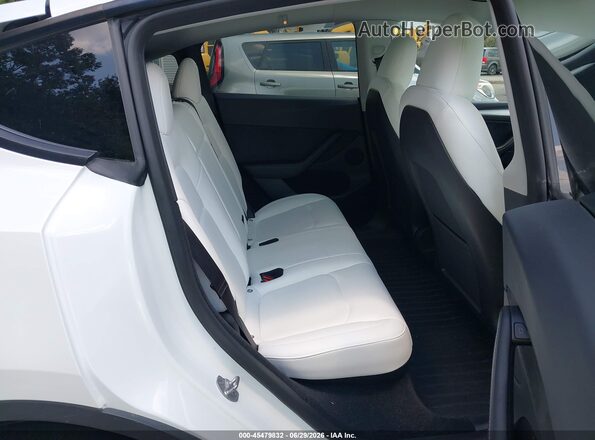 7SAYGDEE8PF697202 2023 TESLA MODEL Y White Vista de la etiqueta del VIN
