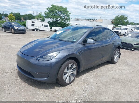 7SAYGDEE8PF699340 2023 TESLA MODEL Y Серый 