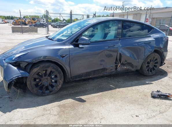 7SAYGDEE8PF807391 2023 TESLA MODEL Y Gray Przód lewy