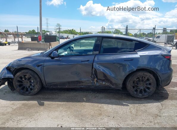 7SAYGDEE8PF807391 2023 TESLA MODEL Y Gray Widok wnętrza z tyłu
