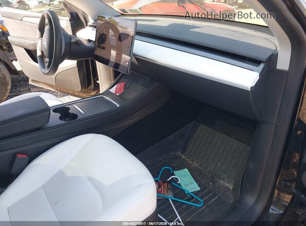 7SAYGDEE8RA219619 2024 TESLA MODEL Y Black Սալոնի դիմացի տեսք