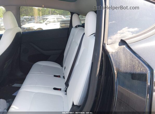 7SAYGDEE8RA219619 2024 TESLA MODEL Y Black VIN կոդի պիտակի տեսք