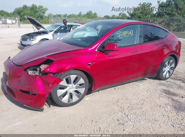 7SAYGDEE8RA275057 2024 TESLA MODEL Y Red Առջևի ձախ երեք քառորդ տեսարան