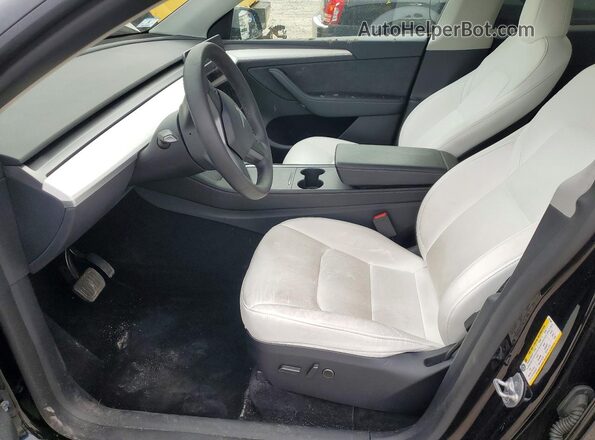 7SAYGDEE8SF297696 2025 TESLA MODEL Black Widok wnętrza z przodu