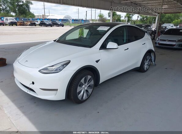 7SAYGDEE9PA035206 2023 TESLA MODEL Y White Առջևի ձախ երեք քառորդ տեսարան