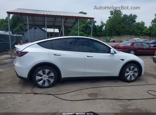 7SAYGDEE9PA037697 2023 TESLA MODEL Y White Vista interior trasera