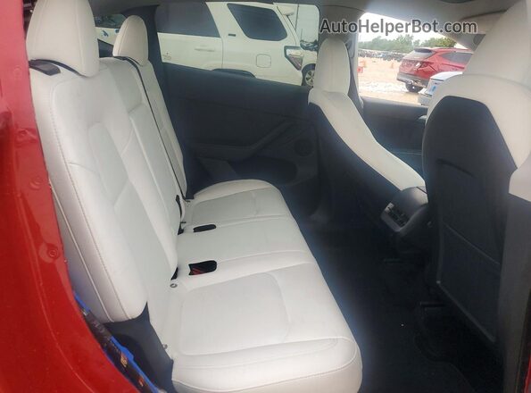 7SAYGDEE9PA099620 2023 TESLA MODEL Red Հետևի նստատեղերի տեսք