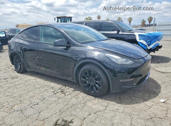 7SAYGDEE9PA109949 2023 TESLA MODEL Черный Передняя правая четверть
