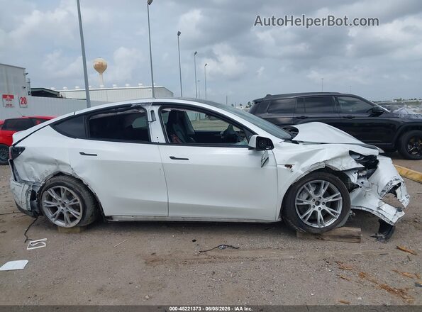 7SAYGDEE9PA127514 2023 TESLA MODEL Y White Вид задньої частини салону