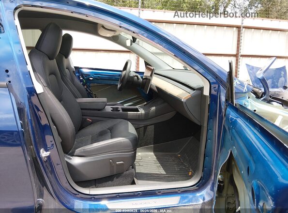 7SAYGDEE9PA129795 2023 TESLA MODEL Y Dark Blue Вид салону спереду