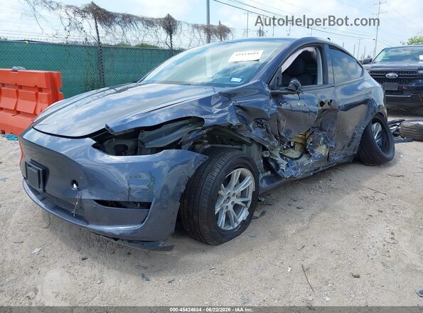 7SAYGDEE9PA162733 2023 TESLA MODEL Y Gray Передня ліва чверть