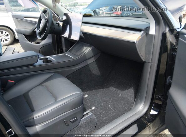 7SAYGDEE9PA189141 2023 TESLA MODEL Y Черный Вид салона спереди