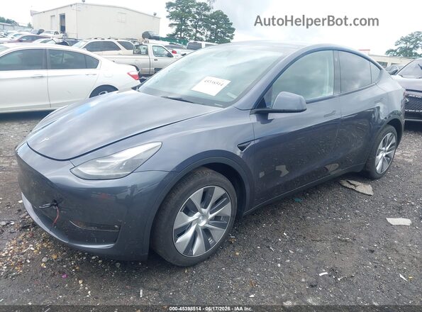 7SAYGDEE9PF710555 2023 TESLA MODEL Y Gray Przód lewy
