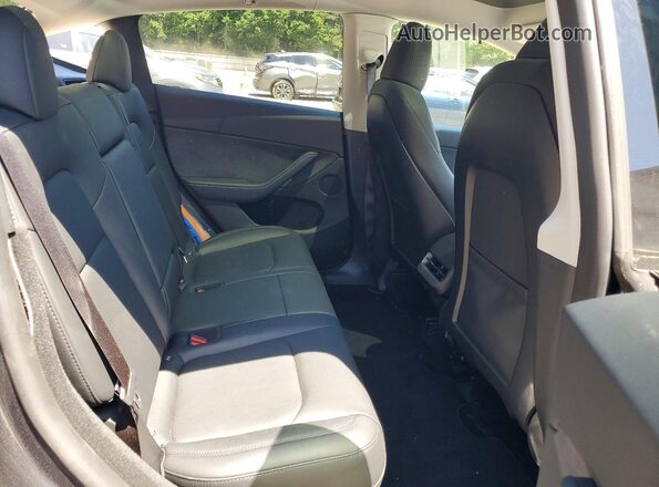7SAYGDEE9RA231178 2024 TESLA MODEL Серый Вид задней части салона