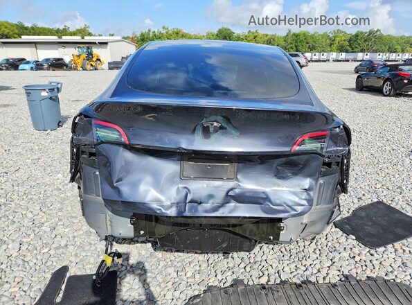 7SAYGDEE9RA321303 2024 TESLA MODEL Gray Vista trasera