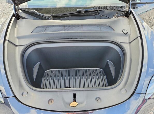 7SAYGDEE9RA321303 2024 TESLA MODEL Gray Vista interior trasera