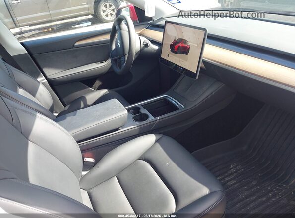 7SAYGDEE9RA325612 2024 TESLA MODEL Y Красный Вид салона спереди
