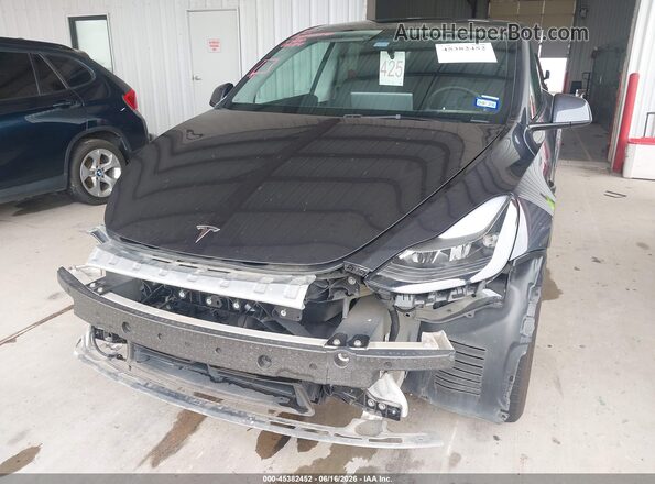 7SAYGDEE9RA336299 2024 TESLA MODEL Y Gray Front view