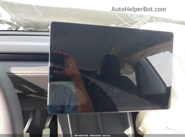 7SAYGDEE9TA623438 2026 TESLA MODEL Y Black Vista interior trasera