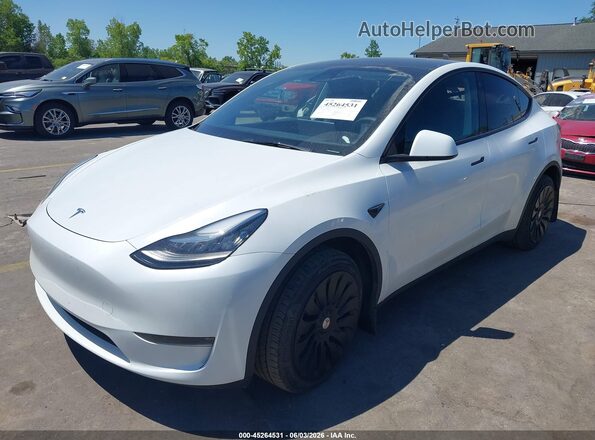 7SAYGDEEXPA069476 2023 TESLA MODEL Y White Vista tres cuartos delantera izquierda