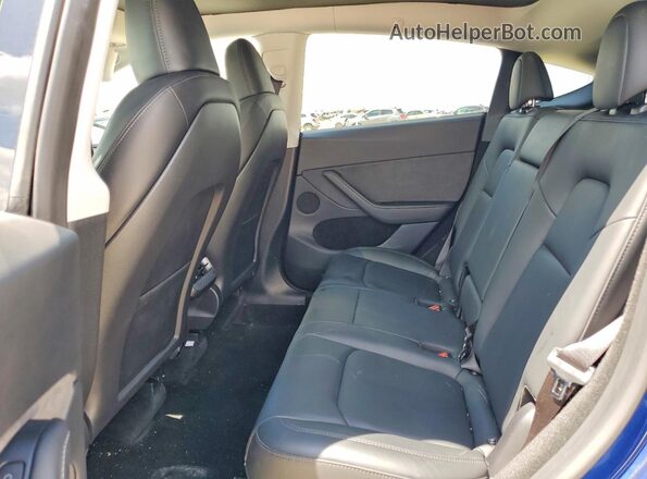 7SAYGDEEXPA136867 2023 TESLA MODEL Blue Vista de los asientos traseros