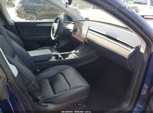 7SAYGDEEXPF702271 2023 TESLA MODEL Y Dark Blue Вид салону спереду