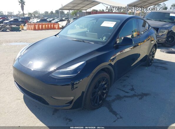 7SAYGDEEXPF855734 2023 TESLA MODEL Y Black Front left